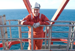 Oil Rig Worker Poses for Photo